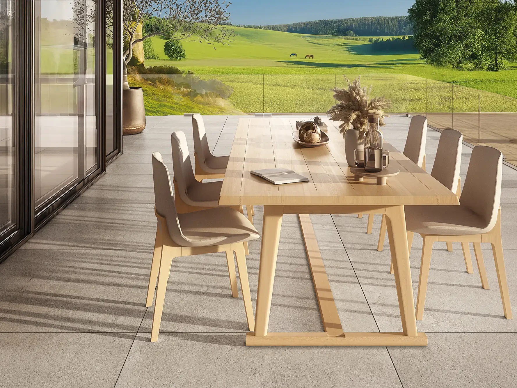 Moderner Outdoor-Essbereich mit 8 Stühlen und Holztisch auf hellgrauer Keramikterrasse in Steinoptik mit Panoramablick ins Grüne